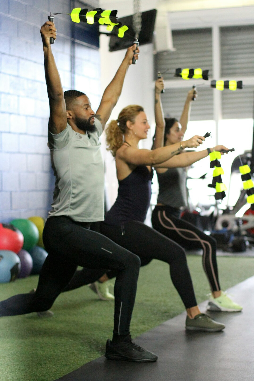Office employees taking part in a corporate fitness class