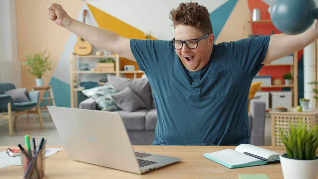 employee exercising at desk