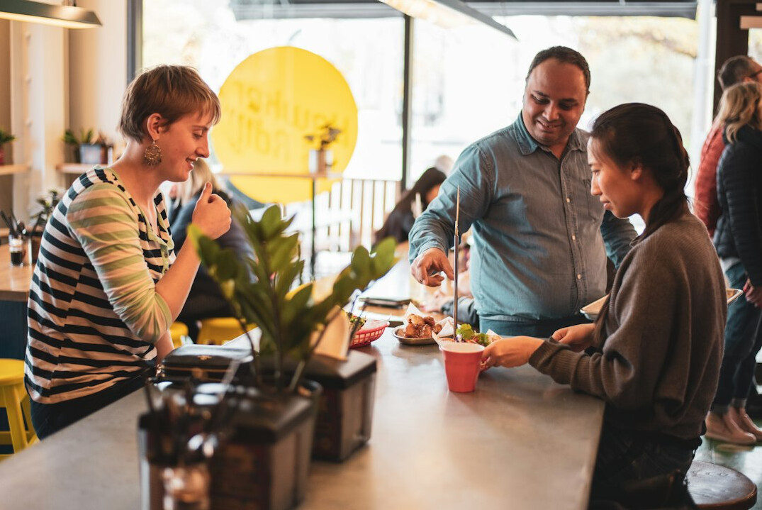 group of employees eating healthy lunch