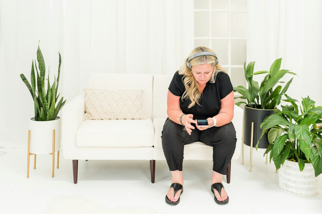 Wellness consultant wearing a headset during a video consultation
